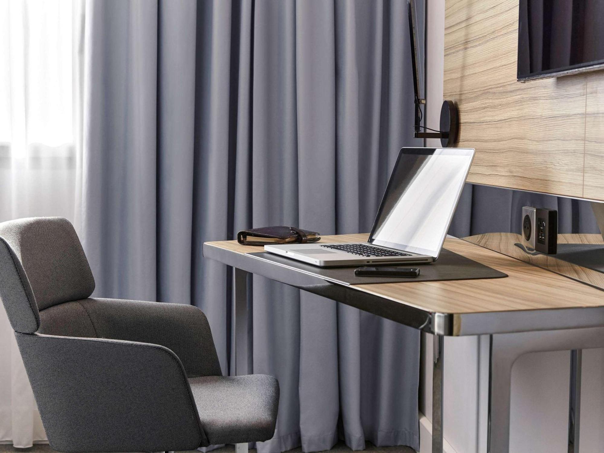 Habitación Doble Superior con 2 camas individuales y sofá cama